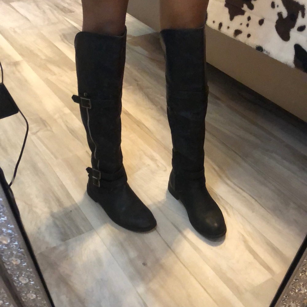 Black over the knee boots.